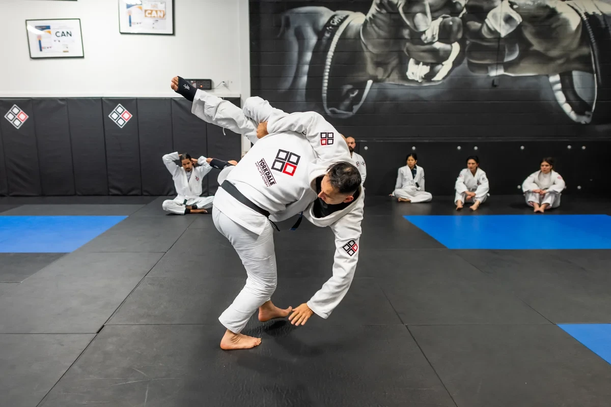 Adult Brazilian Jiu Jitsu throw technique training near Toronto at Yorkdale Martial Arts Academy