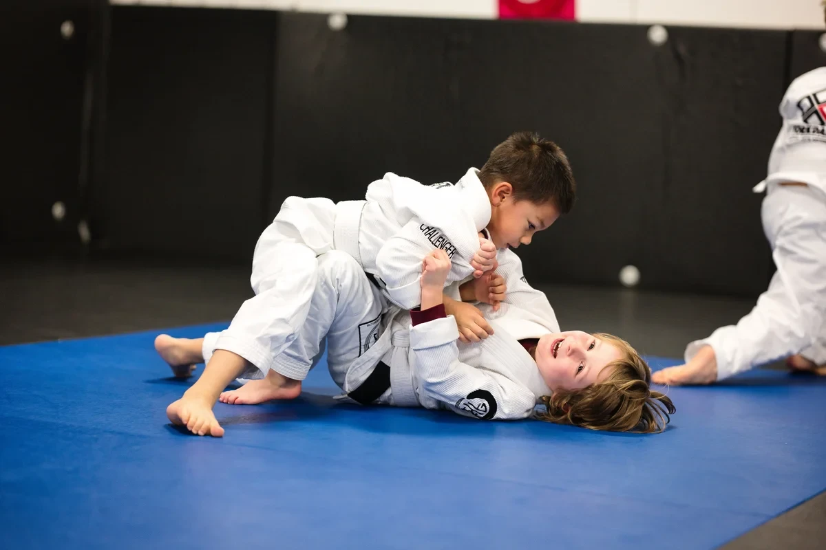 Kids practicing ground training techniques for Toronto students - BJJ fundamentals