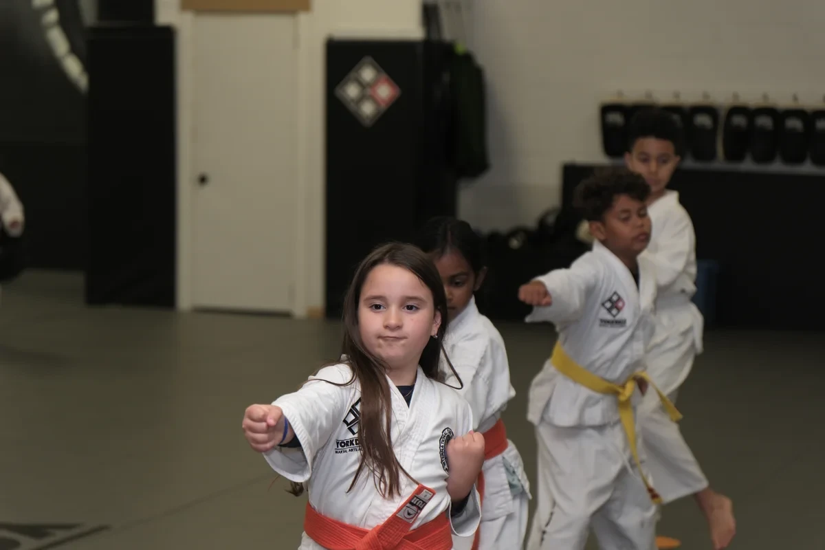 Kids practicing Taekwondo forms near Toronto at Yorkdale Martial Arts Academy - traditional martial arts training