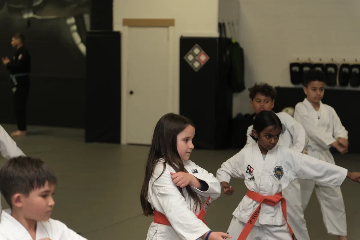 Kids practicing Taekwondo punches at Yorkdale Martial Arts Academy